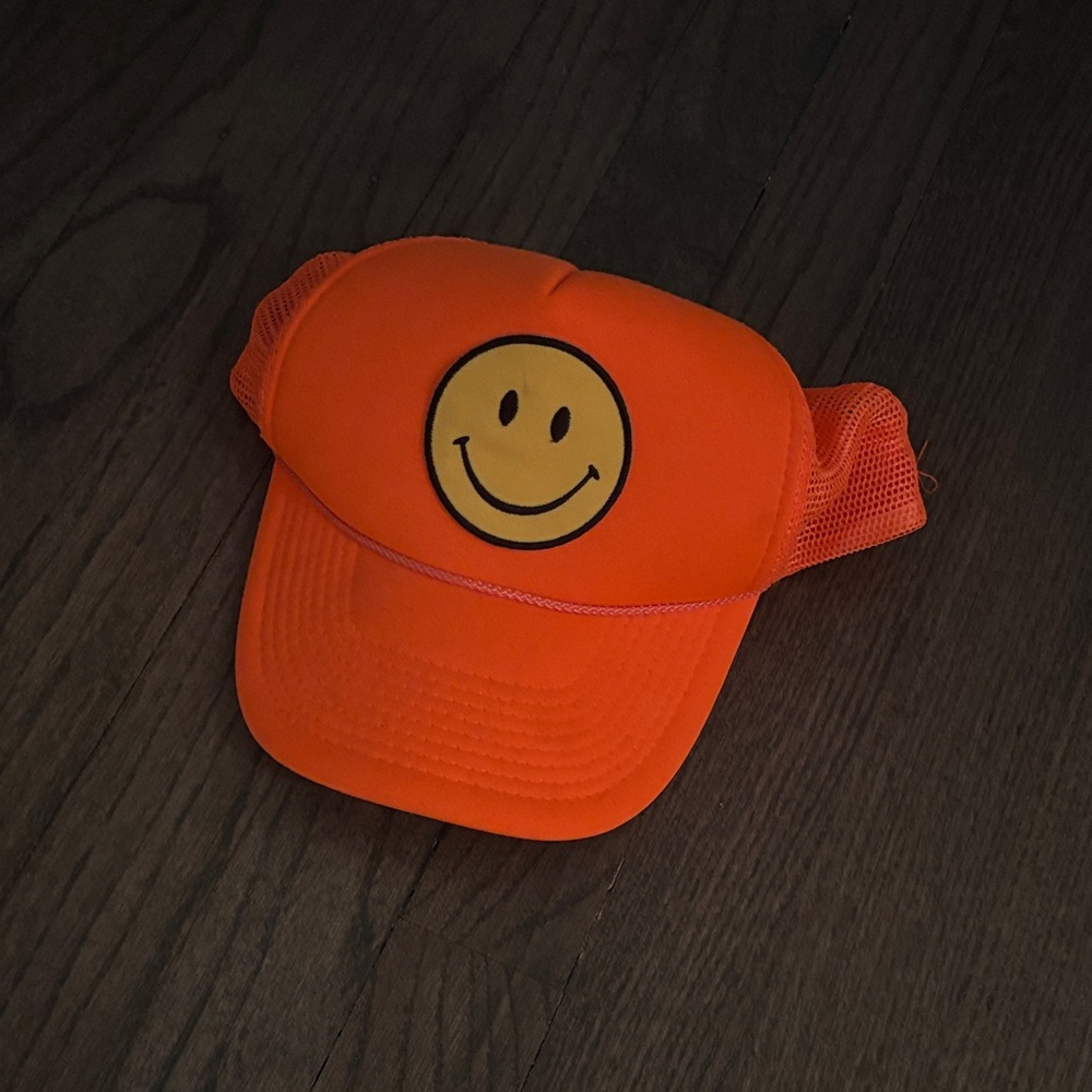 Orange Smiley Face Trucker Hat